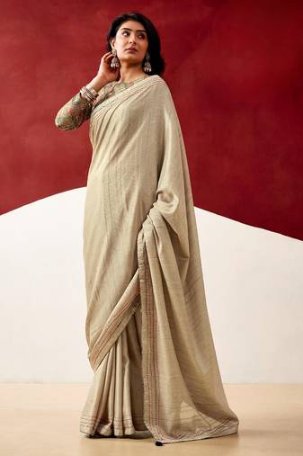 beige color beautiful woven designer tissue fabric saree