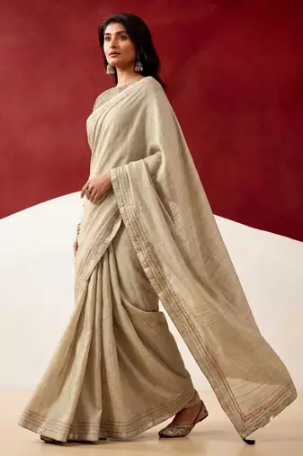 beige color beautiful woven designer tissue fabric saree