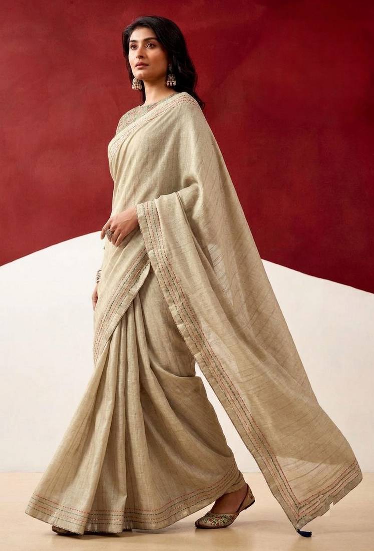 beige color beautiful woven designer tissue fabric saree