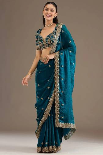 Enchanting blue tissue silk zari and sequins embroidered indian latest design party wear saree