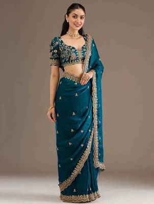 Enchanting blue tissue silk zari and sequins embroidered indian latest design party wear saree 3
