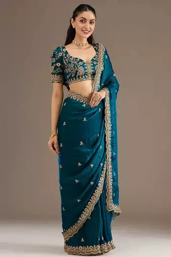 Enchanting blue tissue silk zari and sequins embroidered indian latest design party wear saree