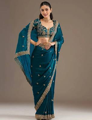 Enchanting blue tissue silk zari and sequins embroidered indian latest design party wear saree 4