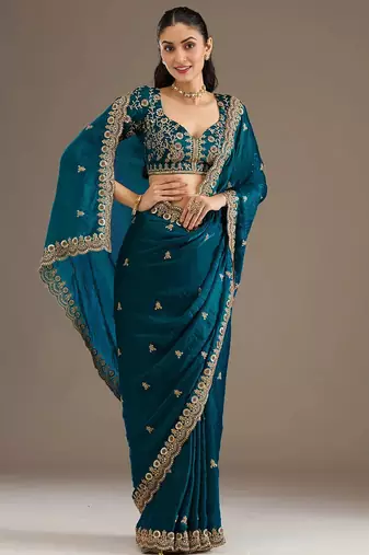 Enchanting blue tissue silk zari and sequins embroidered indian latest design party wear saree