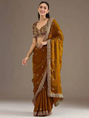 Mesmerizing gold tissue silk zari and sequins embroidered indian latest design wedding sarees 1