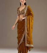 Mesmerizing gold tissue silk zari and sequins embroidered indian latest design wedding sarees