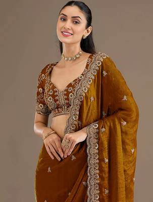 Mesmerizing gold tissue silk zari and sequins embroidered indian latest design wedding sarees 2