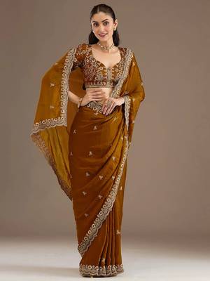 Mesmerizing gold tissue silk zari and sequins embroidered indian latest design wedding sarees 5