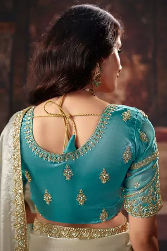Aqua blue fendy satin handwork motif work crystal beads work saree with blouse