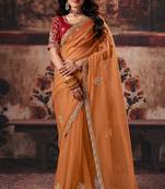 Light orange organza handwork motif work crystal beads work saree with blouse