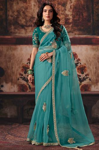 Light teal organza handwork motif work crystal beads work saree with blouse