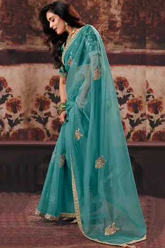Light teal organza handwork motif work crystal beads work saree with blouse