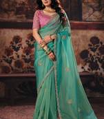 Sea green organza handwork motif work crystal beads work saree with blouse