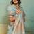 sky blue tissue zari woven, patta, chit pallu with small buttis all over saree with blouse