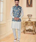 Sky blue jacquard digital print jacket kurta pajama set with fancy buttons.
