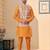 Peach jacquard digital printed jacket kurta pajama set with fancy buttons.