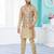 Peach jacquard digital printed jacket kurta pajama set with fancy buttons.