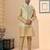 Gold colour heavy banarasi jacquard jacket kurta pajama set with fancy buttons.