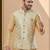 Gold colour heavy banarasi jacquard jacket kurta pajama set with fancy buttons.