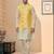Yellow colour heavy banarasi jacquard jacket kurta pajama set with fancy buttons.