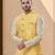 Yellow colour heavy banarasi jacquard jacket kurta pajama set with fancy buttons.