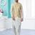 Gold colour heavy banarasi jacquard jacket kurta pajama set with fancy buttons.