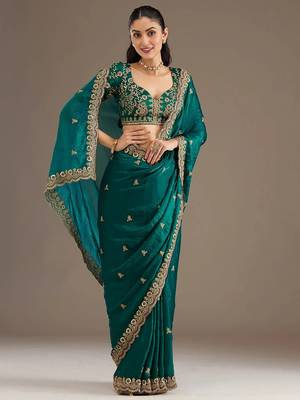 Fetching rama green tissue silk zari and sequins embroidered indian latest design ethnic saree 4