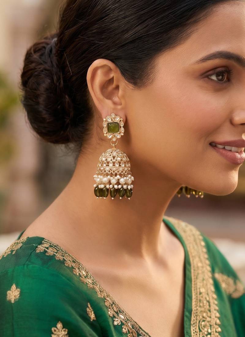 Rose gold plated light green  stone  studded dome jhumka earrings with pearls