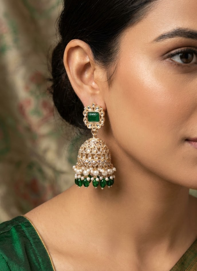 Rose gold plated green stone  studded dome jhumka earrings with pearls