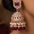 Rose gold plated  ruby stone  studded dome jhumka earrings with pearls