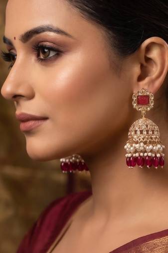 Rose gold plated maroon  stone  studded dome jhumka earrings with pearls
