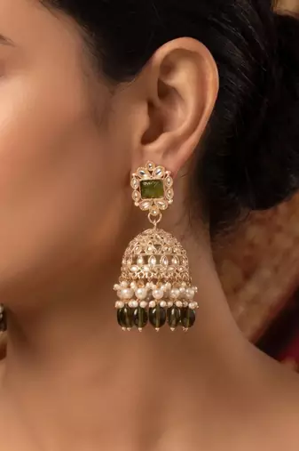 Rose gold plated light green  stone  studded dome jhumka earrings with pearls