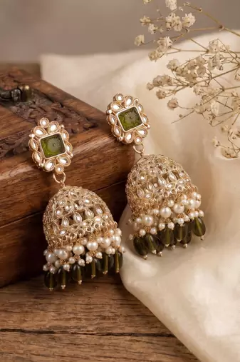 Rose gold plated light green  stone  studded dome jhumka earrings with pearls