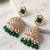 Rose gold plated green stone  studded dome jhumka earrings with pearls