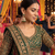 Rose gold plated green stone  studded dome jhumka earrings with pearls