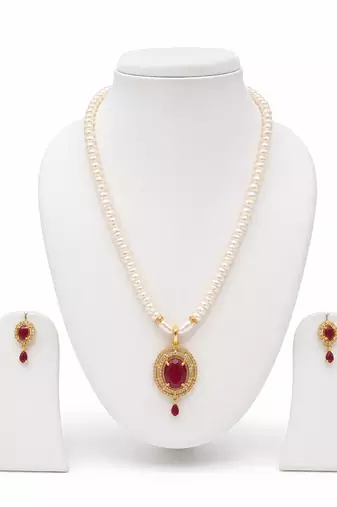 Pearl strand necklace and earring set with ruby pendant gold-tone setting, oval ruby centerpiece, drop earrings included