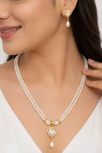 Pearl double strand necklace and earrings set with cz heart pendant gold-tone setting, drop earrings, cz stone accent.