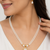 Pearl double strand necklace and earrings set with cz heart pendant gold-tone setting, drop earrings, cz stone accent.