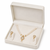 Pearl double strand necklace and earrings set with cz heart pendant gold-tone setting, drop earrings, cz stone accent.