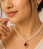 Double strand pearl necklace set with ruby teardrop pendant matching earrings included, gold-tone setting, cz studded.