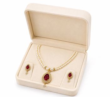 Double strand pearl necklace set with ruby teardrop pendant matching earrings included, gold-tone setting, cz studded. 2
