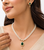 Pearl double strand necklace set with emerald green pendant matching earrings included, teardrop cz pendant, gold-tone.