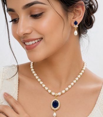 Pearl necklace & earring set with blue sapphire pendant gold-tone accents, cz baguette surround, drop earrings included 1