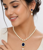 Pearl necklace & earring set with blue sapphire pendant gold-tone accents, cz baguette surround, drop earrings included
