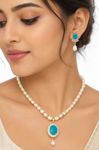 Pearl necklace and earring set with turquoise pendant cz baguette accents, gold-tone spacers, drop pearl earrings.