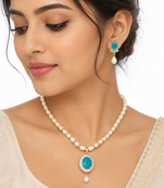 Pearl necklace and earring set with turquoise pendant cz baguette accents, gold-tone spacers, drop pearl earrings.