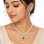 Pearl necklace and earring set with turquoise pendant cz baguette accents, gold-tone spacers, drop pearl earrings.
