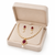 Pearl necklace and earring set with ruby pendant cz baguette accents, gold-tone spacers, drop earrings included.