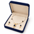Pearl necklace and earring set with blue sapphire pendant gold-tone finish, cz baguette halo, blue stone accents.