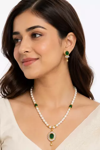 Pearl beaded necklace & earrings set with green stone pendant gold-tone setting, oval green stone, cz baguette accents.